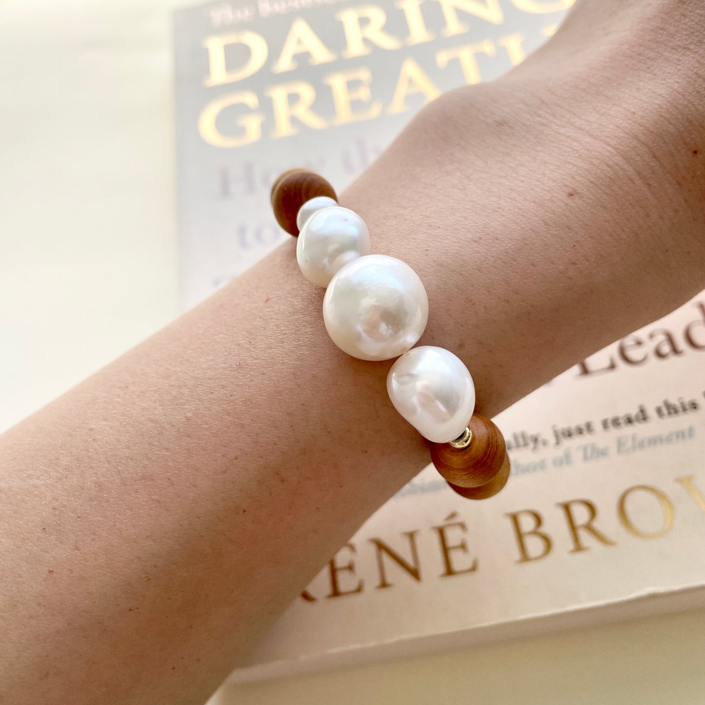 Large pearl bracelet growth on wrist