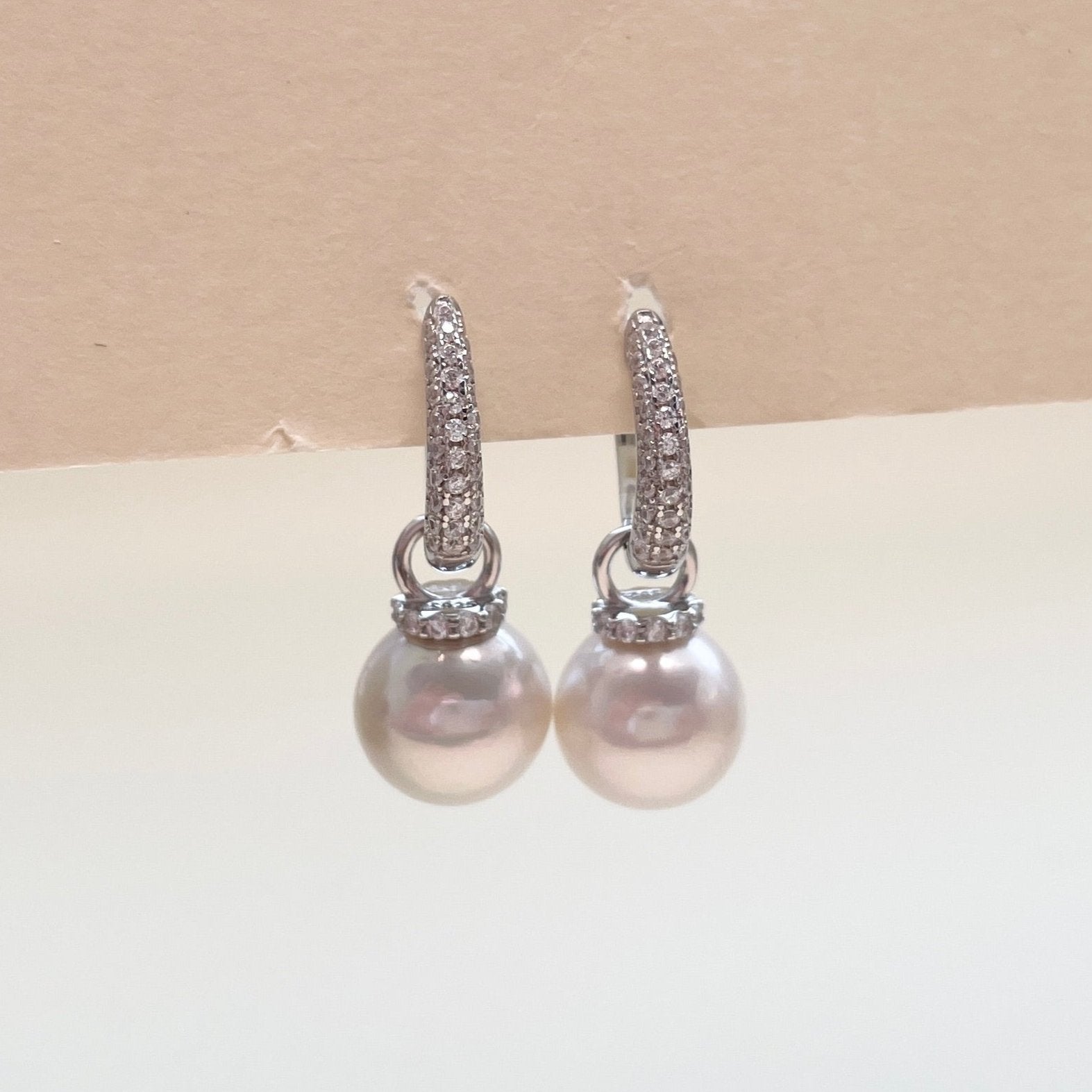 Pearl hoop earrings with cubic zirconia