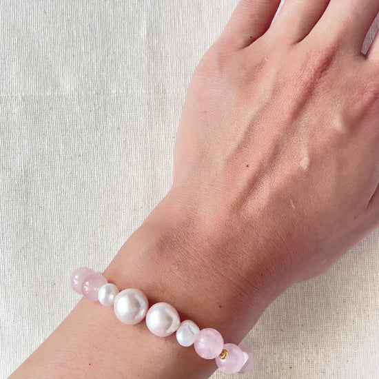 pearl bracelet love on wrist